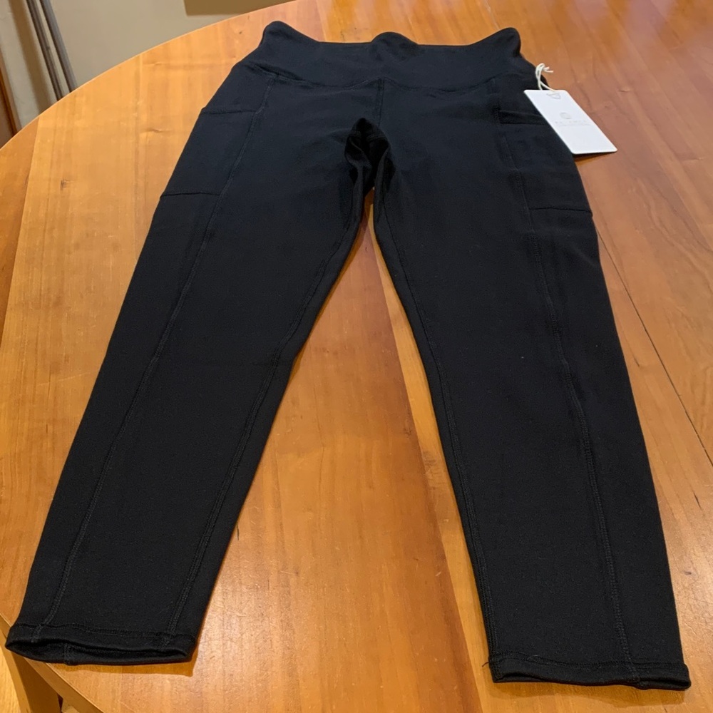 Balance Collection Black Activewear Leggings. Has Pockets on sides. 25” ankle